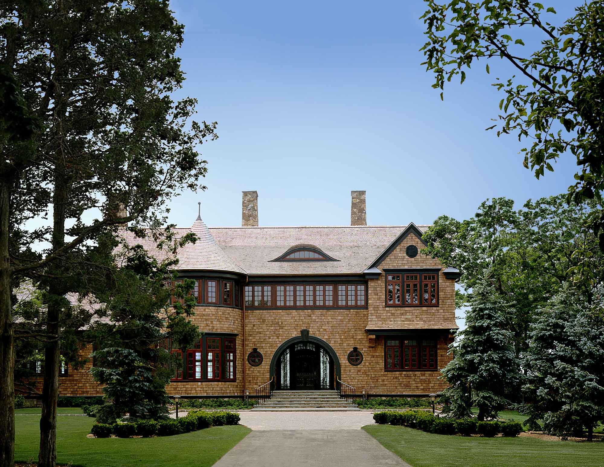 Exterior shingle style home, long island, brow dormer, arched entry, driveway, courtyard Asharoken